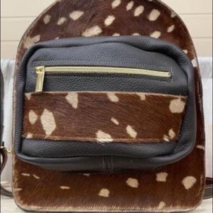 Handmade Cow-hide Leather backpack with front pocket